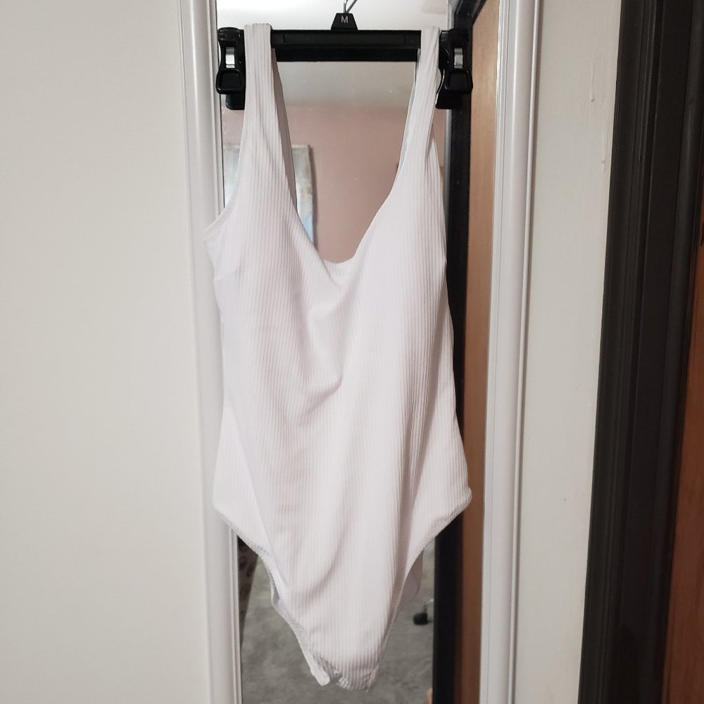 One piece white bathing suit